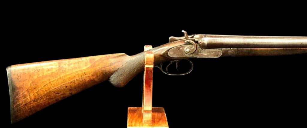 W. Richards Antique Black Powder Side By Side Shotgun: Offered here for your consideration is a W. Richards antique black powder side-by-side shotgun. This example features side by side barrel and a walnut stock with checkering at the wrist. A classic old