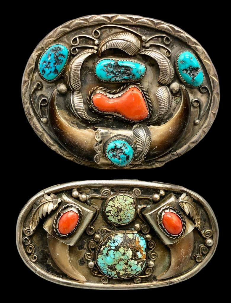 Two Vintage Coral And Claw Buckles: Available here in this lot are two vintage coral and claw buckles. Each piece features coral and turquoise cabochons set in silver bezels. Accenting the stones are claw motifs, silver dots, leaves and