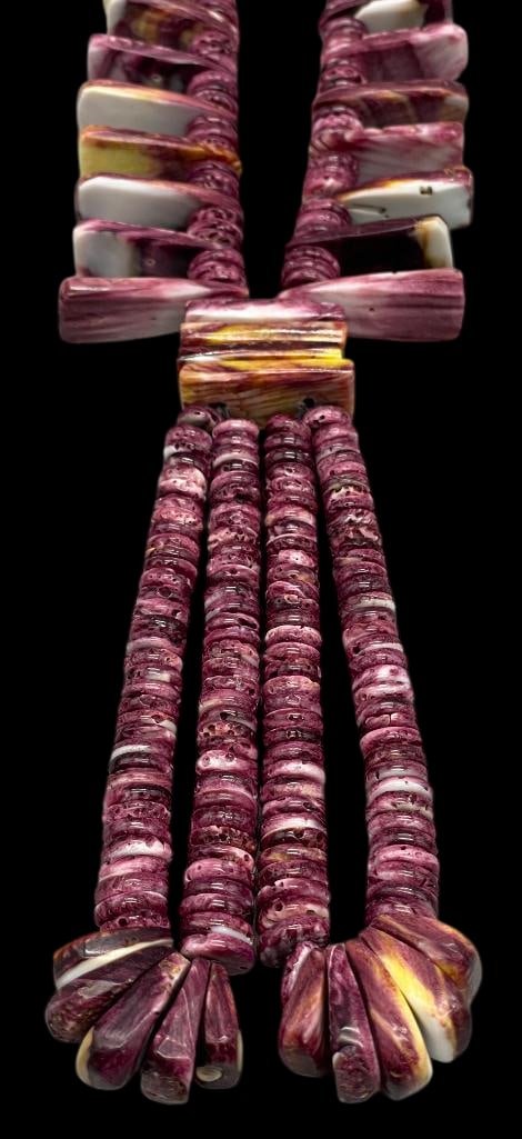 Purple Spiny Oyster Jocla Necklace: Offered here for your consideration is a purple spiny oyster Jocla necklace. This piece features a strand of purple spiny oyster disc beads accented with tabs throughout. At the bottom, rectangular pu