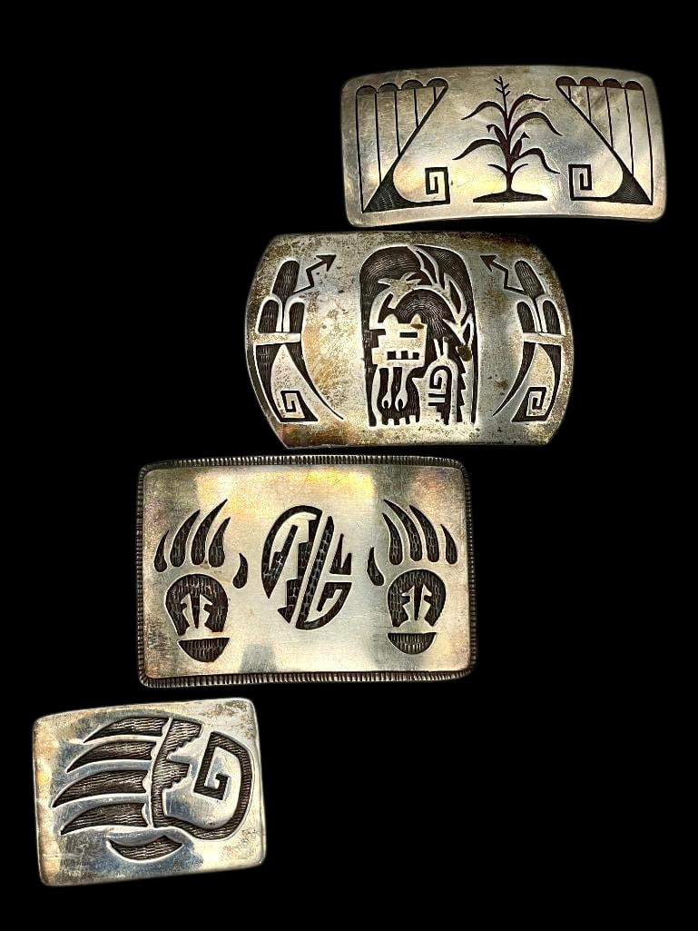 Four Hopi And Navajo Sterling Silver Belt Buckles: Offered here for your consideration are four Hopi and Navajo sterling silver belt buckles. These pieces each feature an overlay design accented with etched and darkened silver backgrounds. The pattern