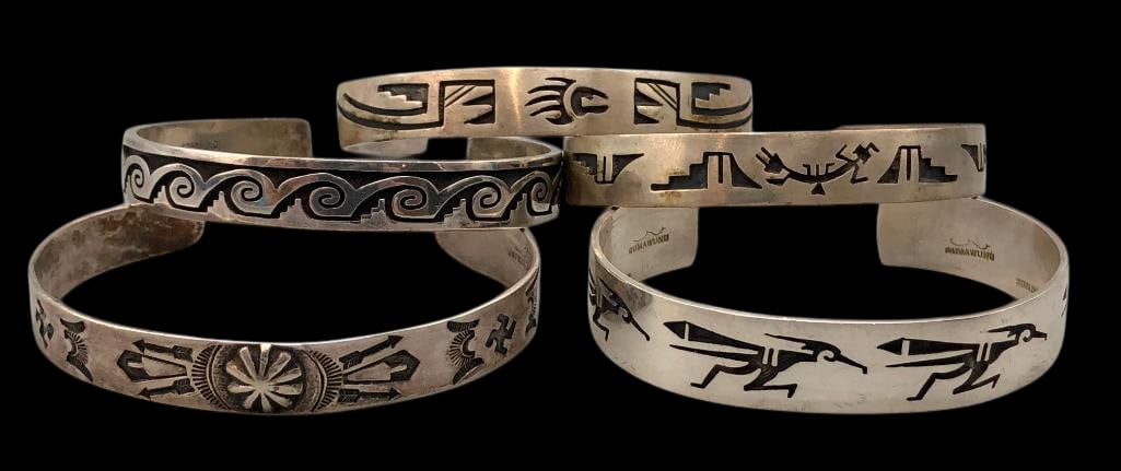 Four Sterling Silver Bracelets And One Garden Of Gods Bracelet: Available here for your consideration are four sterling silver bracelets and one Garden of Gods bracelet. Each cuff showcases either a hand stamped or overlay design with precise cutouts and clean lin