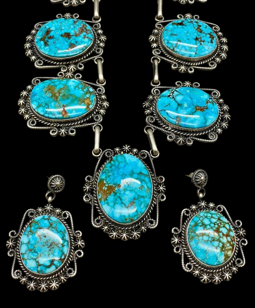 High Grade Kingman Webbed Turquoise Necklace With Earrings By Ray Delgarito: For your bidding enjoyment we present a high grade Kingman webbed turquoise necklace with earrings by Ray Delgarito. The necklace features nine pendants in graduated sizes, each highlighted with webbe