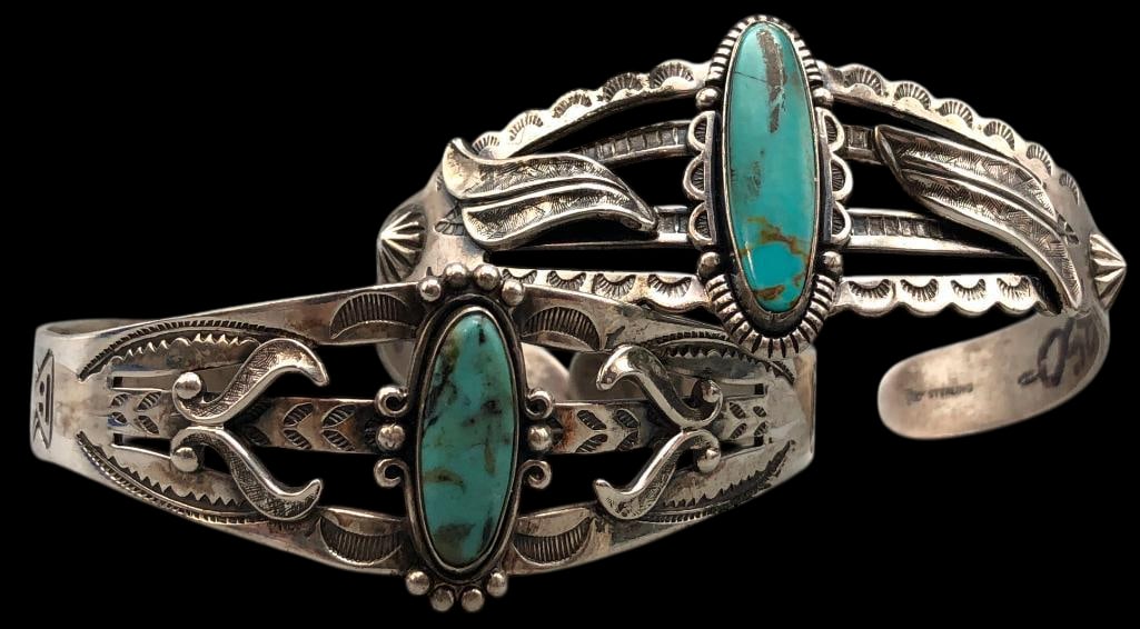 Two Fred Harvey Era Sterling Silver Bracelets: Available here in this lot are two Fred Harvey Era sterling silver bracelets. The bracelets feature hand stamped arrows, faces and geometric designs along the bands. Both are made from three and four