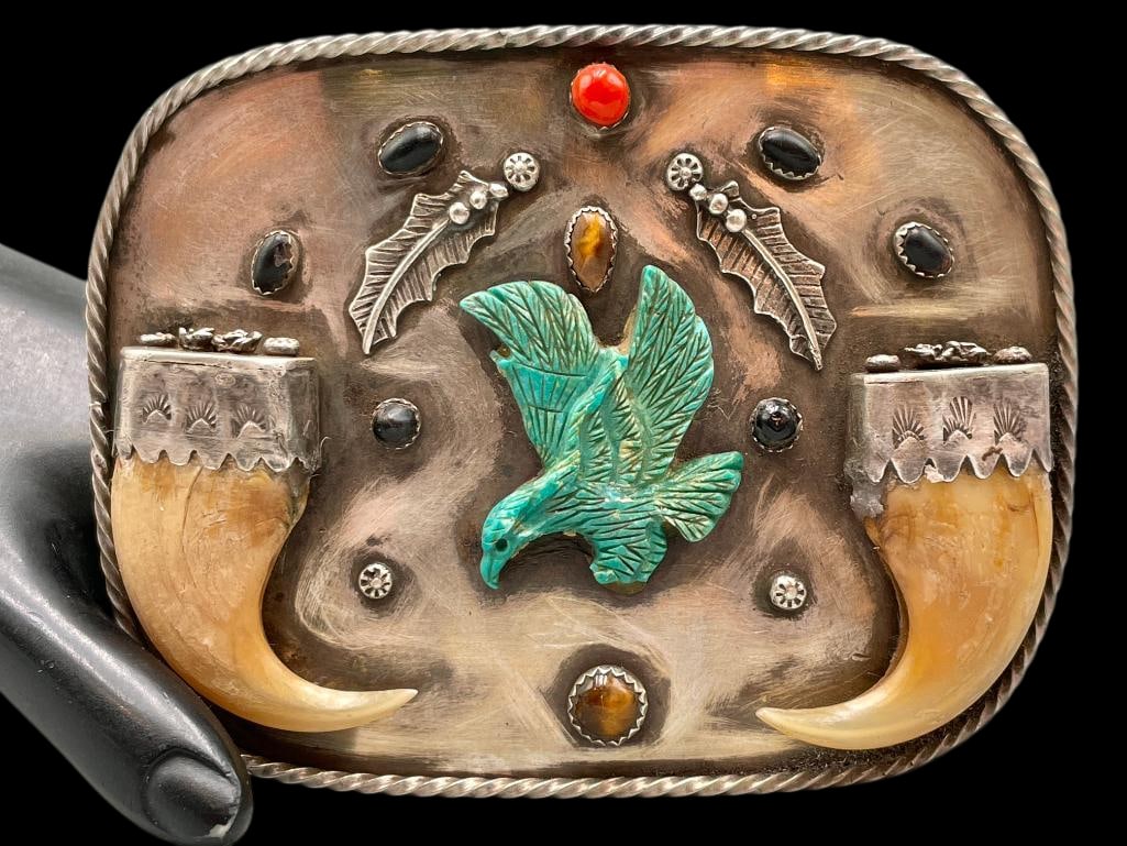 Carved Turquoise And Claw Sterling Silver Buckle: Offered here for your consideration is a carved turquoise and claw sterling silver buckle. This piece features a carved turquoise eagle centerpiece along with multiple stone cabochons set in sawtooth