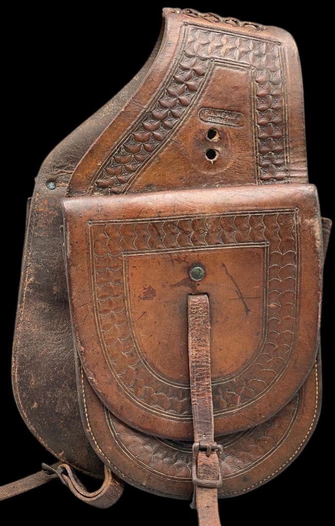 Antique Leather F.A. Meanea Saddle Bags: Offered here for your consideration are a set of antique leather F. A. Meanea saddle bags. They feature two expandable leather pockets/bags with flaps and buckle closures. The leather is dark brown