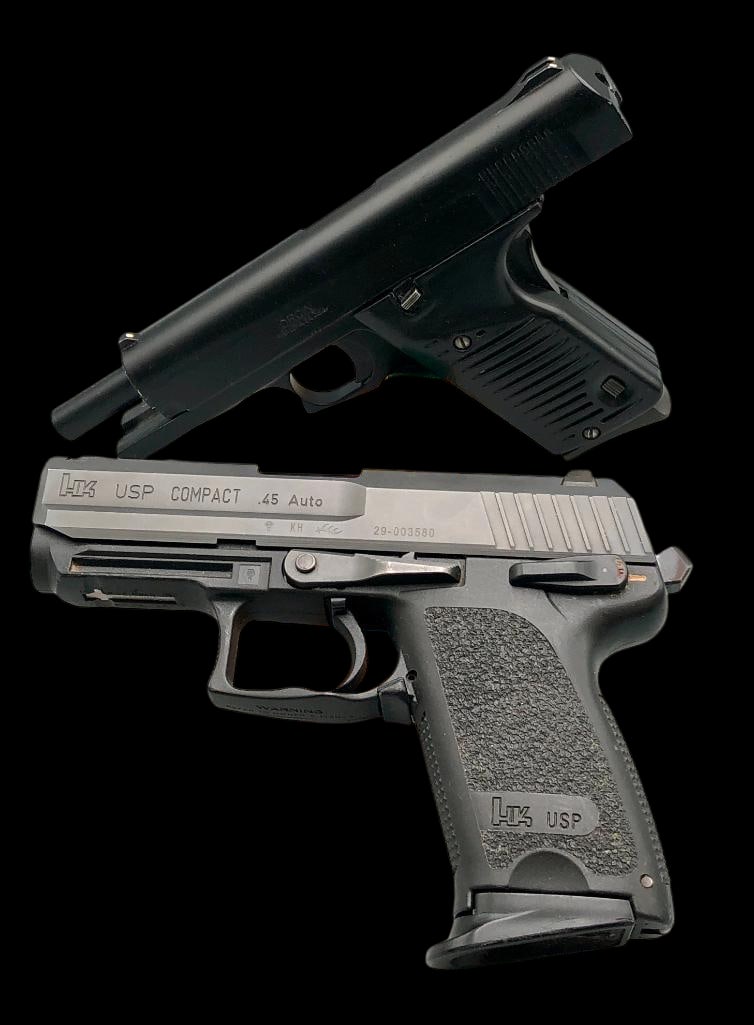 Two Contemporary Handguns - One Heckler And Koch .45 Automatic, One Lorcin L 9mm: For your bidding pleasure are two contemporary handguns, one Heckler and Koch, one Lorcin 9mm. The Lorcin L 9mm is a full sized semi automatic pistol. Some have labeled "Saturday Night