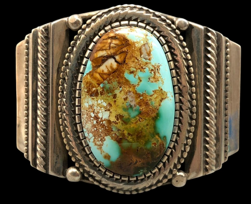 Sterling Silver And Royston Turquoise Bracelet By Rick Martinez: Offered here for your consideration is a sterling silver and Royston turquoise bracelet by Rick Martinez. This bracelet is highlighted with a Royston turquoise cabochon set in a serrated silver bezel.
