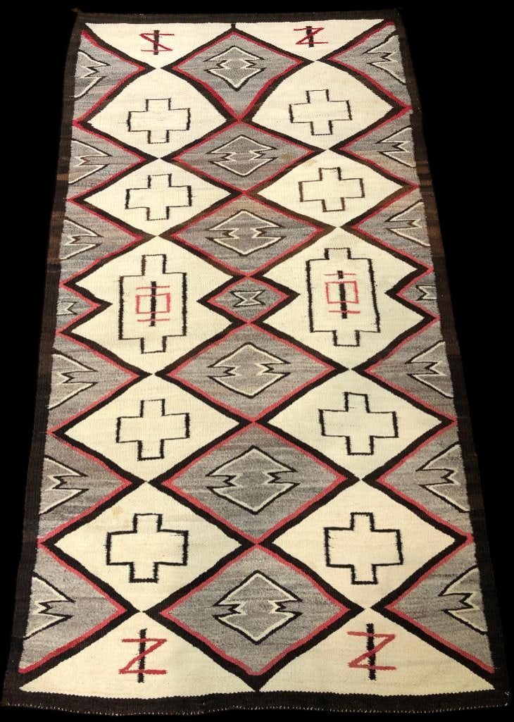 Circa 1930s-1940s Custom Navajo Rug: Available here for your consideration is a circa 1930-1940s custom Navajo rug. This rug displays a series of diamond motifs, each enclosing a cross design. At the center, two adjoining diamonds anchor
