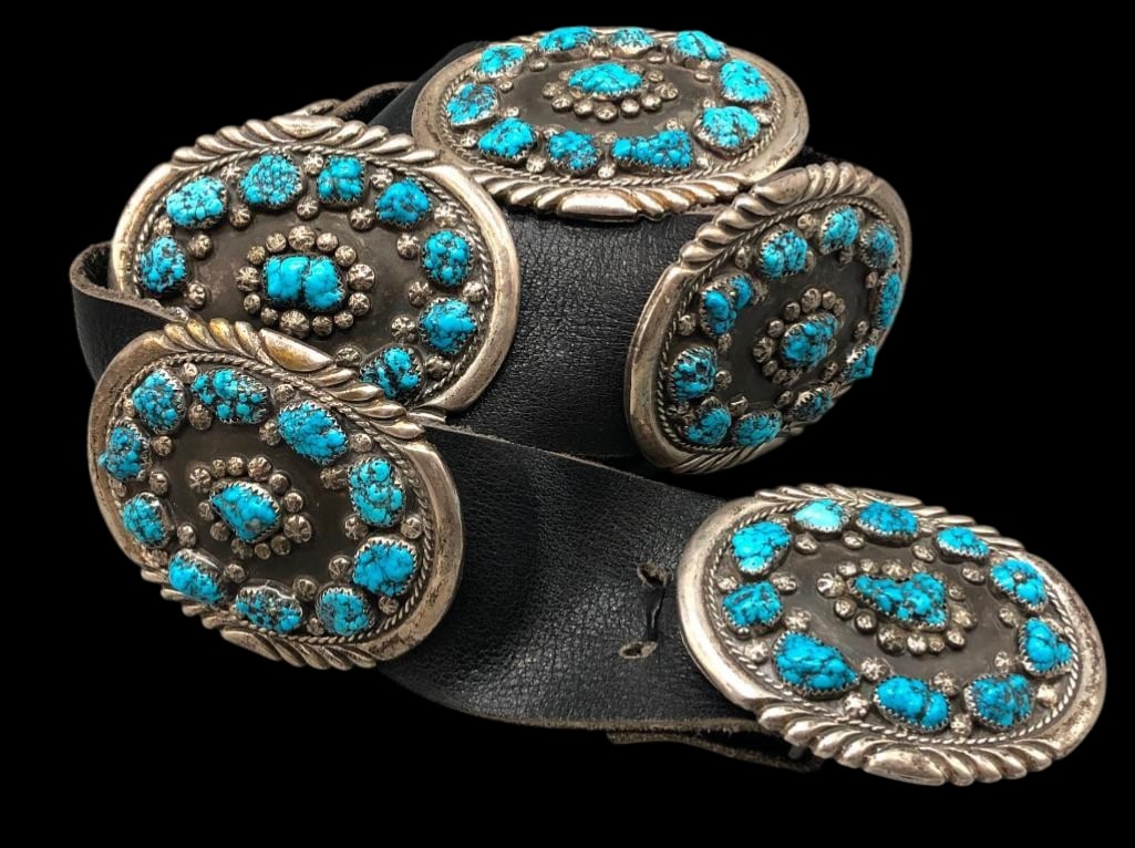 Sterling Silver And Turquoise Concho Belt: Offered here for your consideration is a sterling silver and turquoise concho belt. This piece features eight oval conchos and matching buckle each highlighted with nugget style turquoise cabochons se