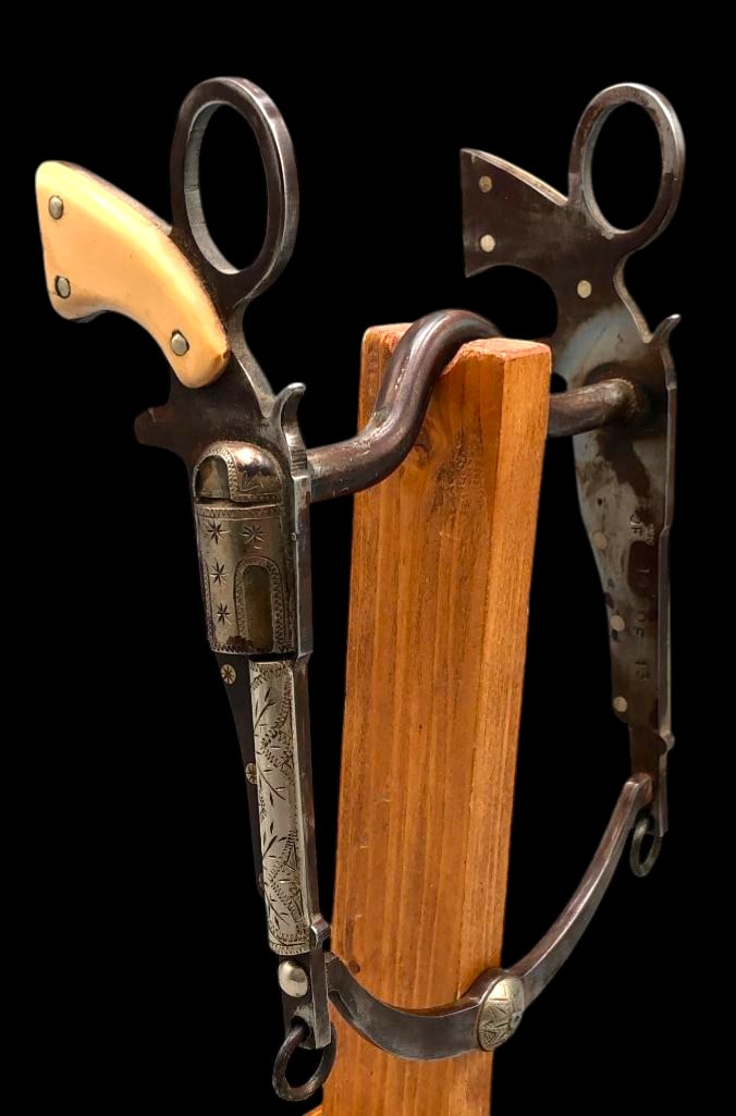 Jack Ferguson Canyon City Pistol Bit #10/13: Offered here for your consideration is a Jack Ferguson Canyon City pistol bit numbered 10/13. This bit features revolver style cheeks with engraved silver panels and faux ivory grips. The cheeks attac