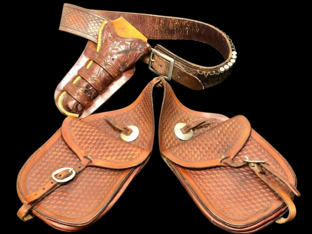 H.H. Heiser Triple Loop Holster With Belt And Saddle Bags: Offered here for your consideration is a H.H. Heiser triple loop holster with belt and saddle bags. There a hand tooled leather holster with a triple loop design, accented by floral detailing and cart