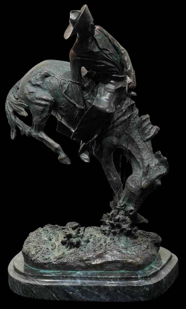 Outlaw An After Frederick Remington Bronze Statue: Offered here for your consideration is "Outlaw" an after Frederick Remington bronze statue. This piece depicts a rider on a bucking horse. It is a vintage recasting, mounted on a green marble
