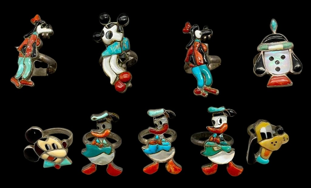 Nine Disney Themed Inlay Rings: Offered here for your consideration are nine Disney themed inlay rings. Each piece features a multi stone figural inlay depicting various Disney characters such as Donald Duck, Mickey Mouse and Goofy.