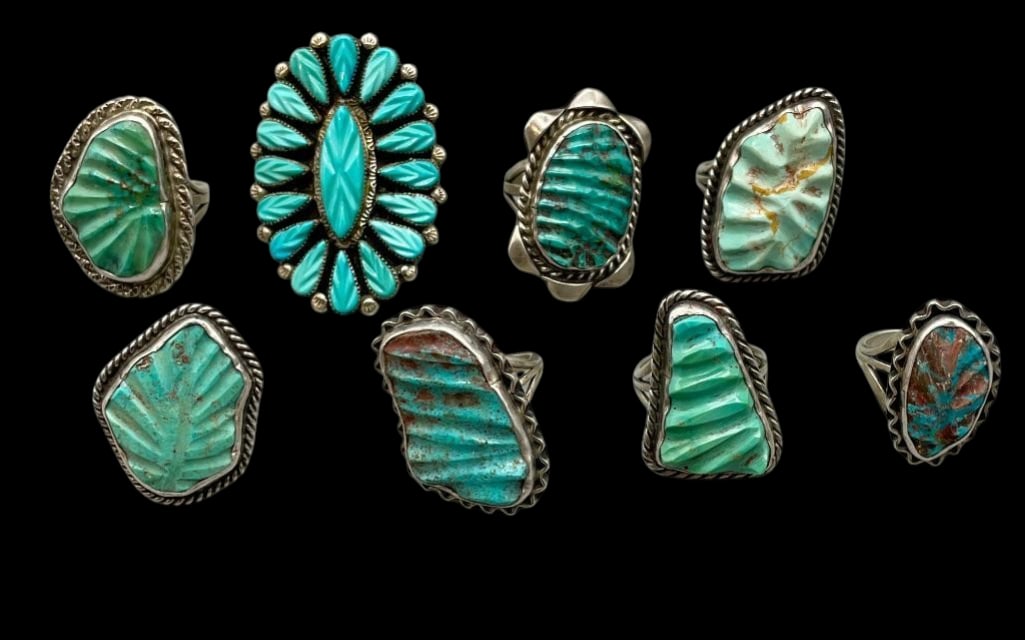 Eight Vintage Zuni Carved Turquoise And Sterling Silver Rings: Offered here for your consideration are eight vintage Zuni carved turquoise and sterling silver rings. Each ring showcases carved turquoise cabochons set in silver bezels. Accenting the stones are twi