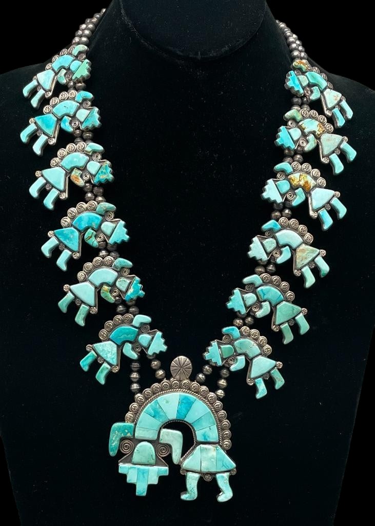 Federico Jimenez Turquoise Rainbow Man Squash Blossom Necklace: Offered here for your consideration is a Federico Jimenez turquoise Rainbow Man squash blossom necklace. The naja is in the shape of a Rainbow Man inlaid with turquoise set in silver. Accenting the st