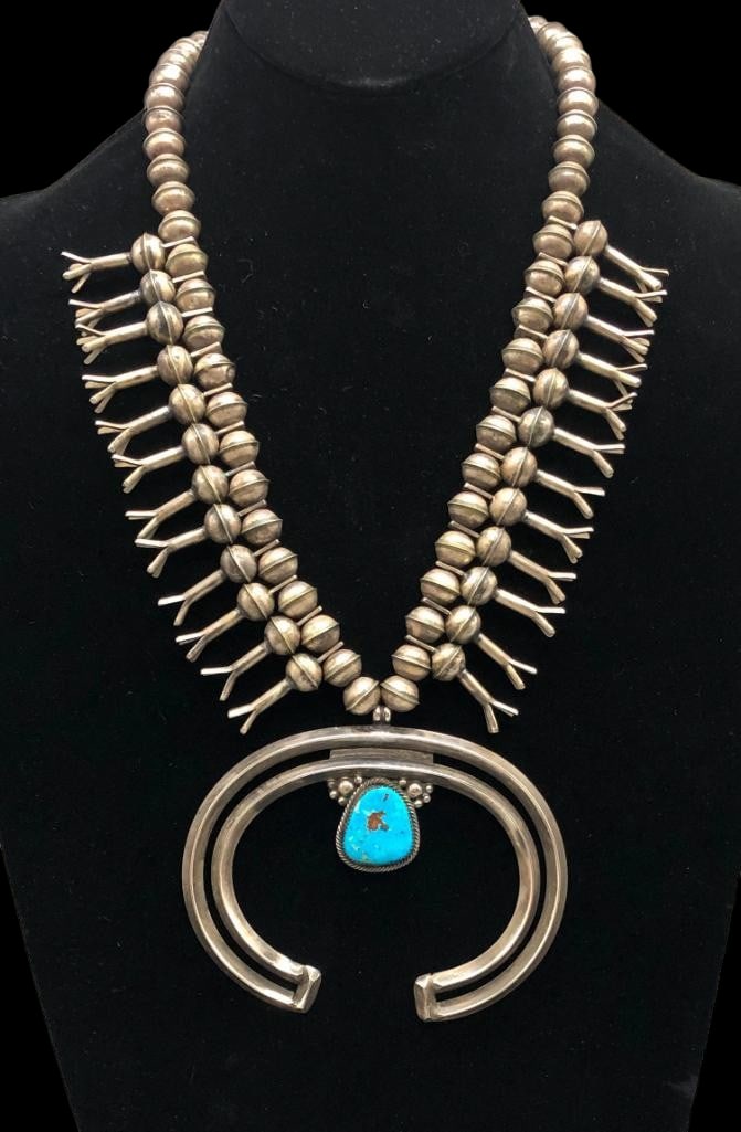 Statement Sterling Silver and Turquoise Four Petal Blossom Squash Blossom Necklace by Gabriel Jurado: Offered here for your consideration is a statement sterling silver and turquoise four petal squash blossom necklace by Gabriel Jurado. The two wire carinated naja features a turquoise cabochon set in