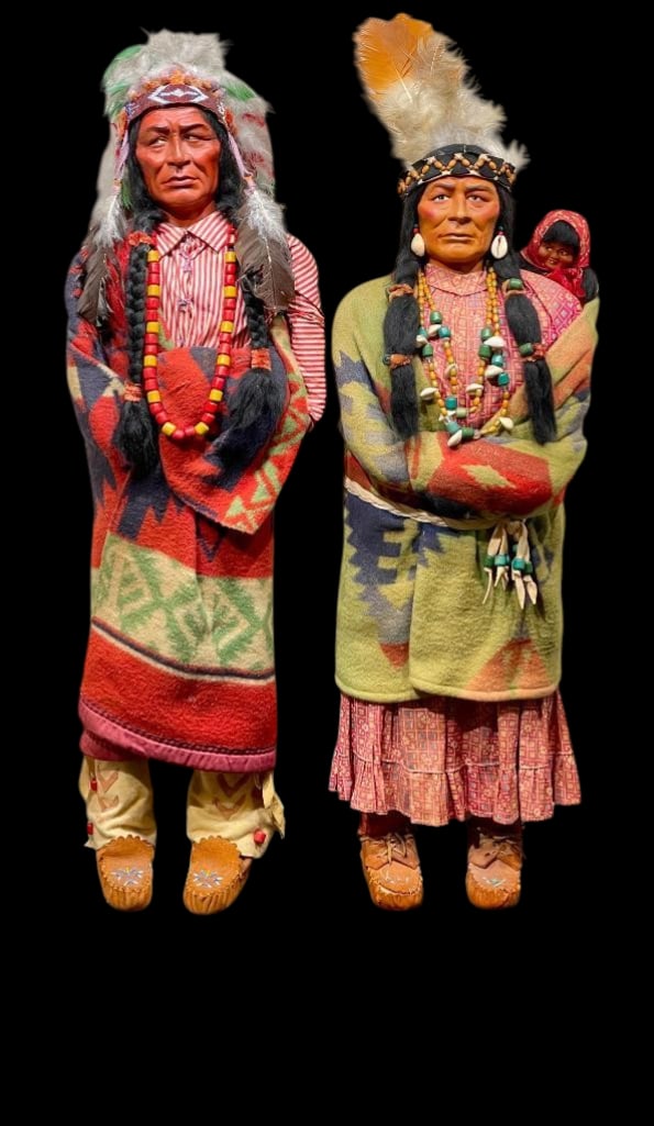 Two Large Size Store Display Skookum Dolls With Magazine Article About Linda Larouche Winter: Offered here for your consideration are two large size store display Skookum dolls with a magazine article on famed Skookum collector Linda Larouche Winter. Skookum dolls were typically sold in touris