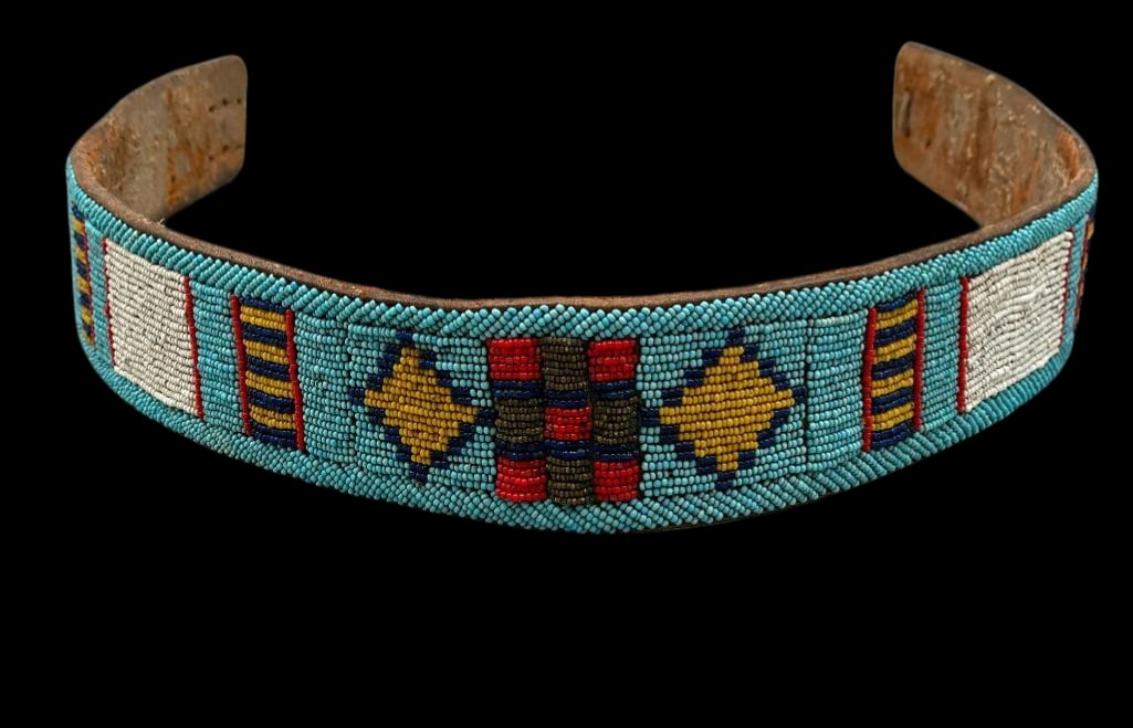 Circa 1890-1910 Plains Beaded Belt: Offered here for your consideration is a circa 1890-1910 Plains beaded belt. This piece features seed beadwork arranged in geometric designs done in colors of white, red, yellow and others. The beads