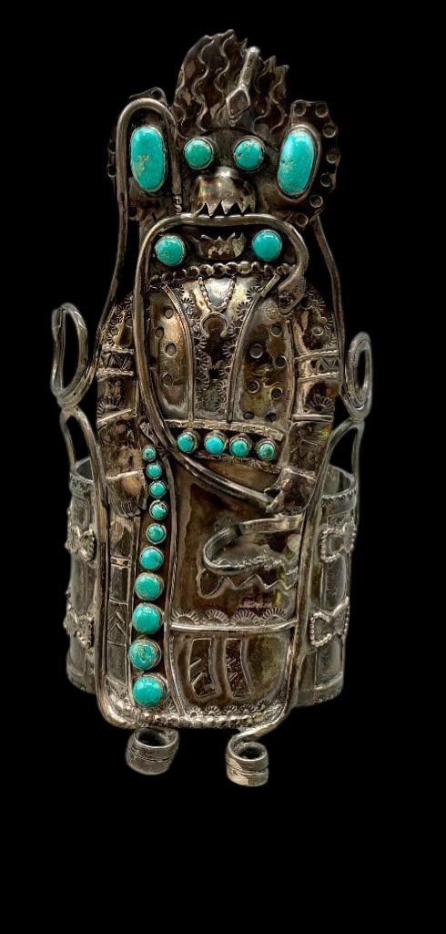 PHENOMENAL Vintage Sterling Silver Saviki Kachina Themed Bracelet: Offered here for your consideration is a PHENOMENAL vintage sterling silver Saviki Kachina themed bracelet. This large cuff features a Kachina design highlighted with 20 turquoise cabochons set in smo
