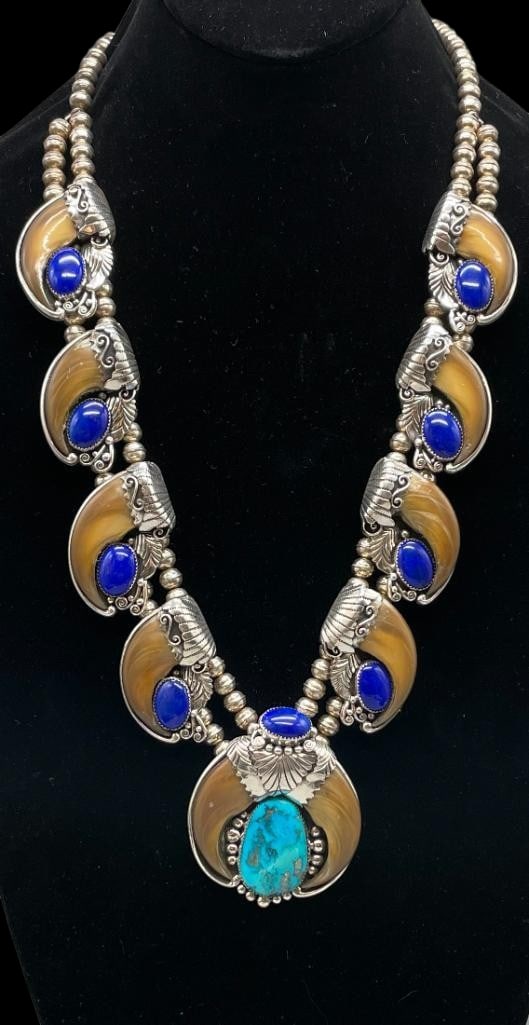 Sterling Silver, Lapis, Turquoise And Claw Squash Blossom Necklace By Edison Gruber: Offered here for your consideration is a sterling silver, lapis, turquoise and claw squash blossom necklace by Edison Gruber. This necklace features a naja highlighted with a turquoise and lapis caboc