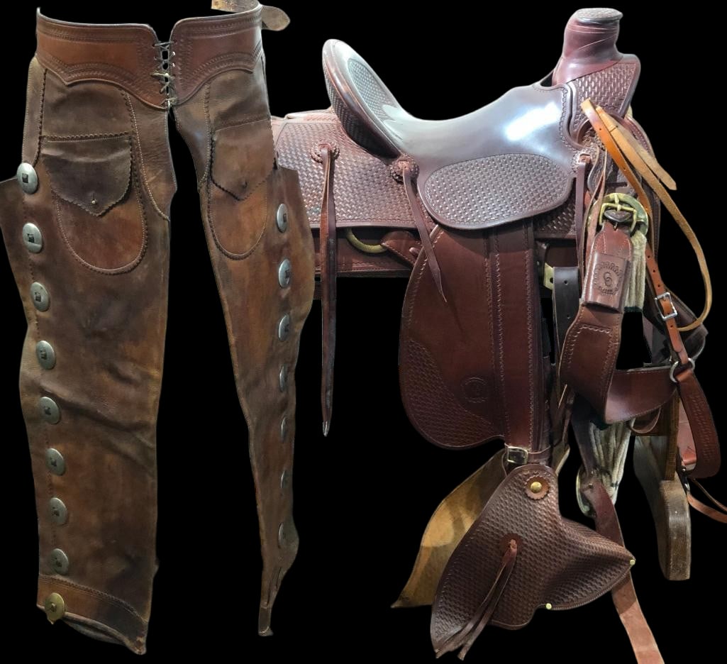 Wade Saddle With Pair Of Shot Gun Chaps: Offered here for your bidding enjoyment is a Wade saddle with pair of shot gun chaps. Wade saddles are known for their superior comfort, functionality and close connection to the horse. This ranch sad