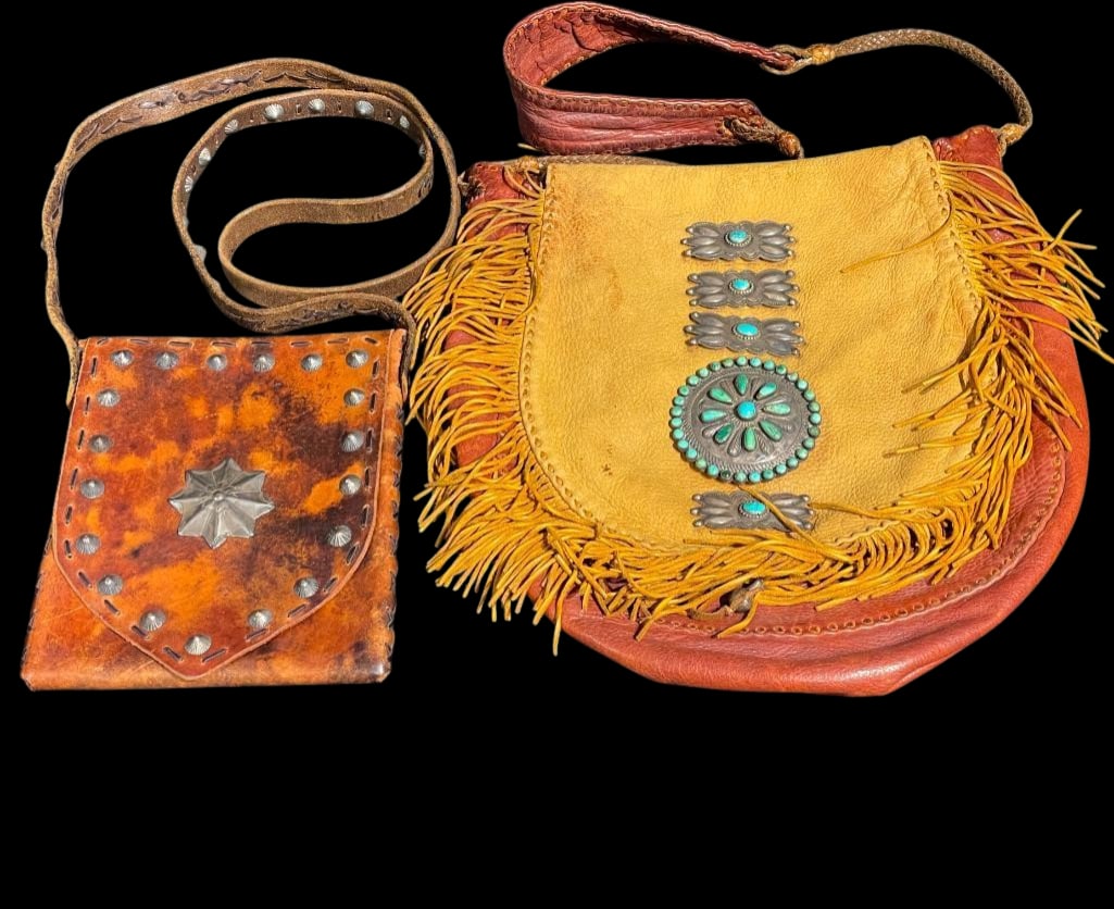 Two Bags With Navajo Silver Pieces: Offered here for your consideration are two leather bags with Navajo silver. The first features three butterfly conchos and one circular concho highlighted with turquoise cabochons set in smooth silve