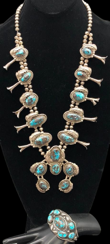 Vintage Statement Persian Turquoise And Sterling Silver Squash Blossom Necklace With Bracelet: Offered here for your consideration is a vintage statement Persian turquoise and sterling silver squash blossom necklace with bracelet. The necklace features a two wire naja highlighted with six high
