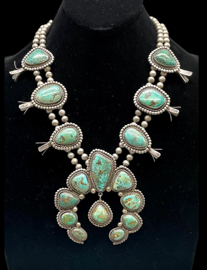 Vintage Four Petal, Handmade Beads And Nice Green Turquoise Squash Blossom Necklace: Offered here for your consideration is a vintage four petal, handmade beads and nice green turquoise squash blossom necklace. This necklace features a naja highlighted with nine high grade turquoise c