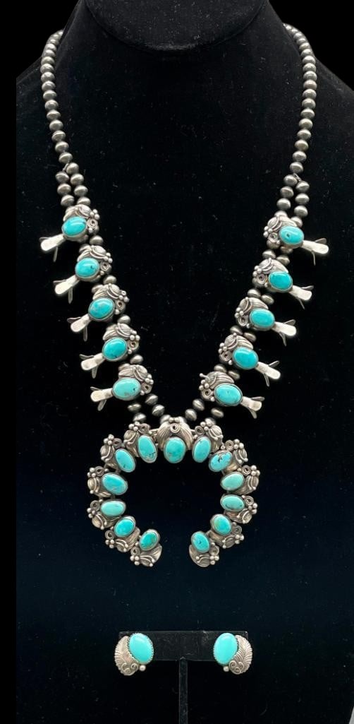 Turquoise And Sterling Silver Squash Blossom Necklace With Earrings: Offered here for your consideration is a turquoise and sterling silver squash blossom necklace with earrings. The two wire naja features 13 turquoise cabochons all set in smooth silver bezels. Accenti