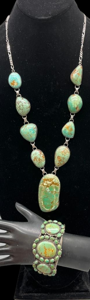Vintage Green Turquoise And Sterling Silver Necklace With Kirk Smith Turquoise Cluster Bracelet: Offered here is a vintage green turquoise and sterling silver necklace with a Kirk Smith turquoise cluster bracelet. This piece features a prominent pendant highlighted with a large green turquoise ca
