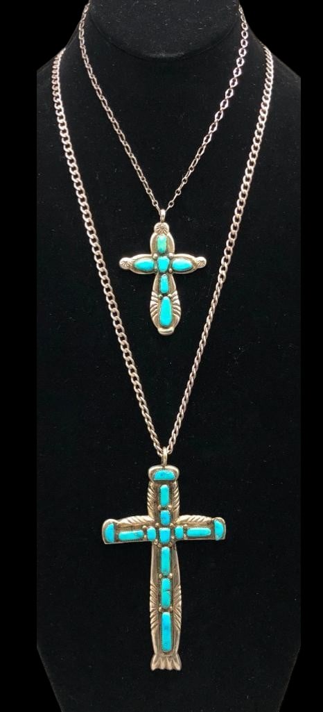 Two Vintage Turquoise And Sterling Silver Crosses - Iule: Offered here for your consideration are two vintage turquoise and sterling silver crosses made by the Iule family of Zuni, NM. These striking cross pendants are highlighted with clusters of turquoise