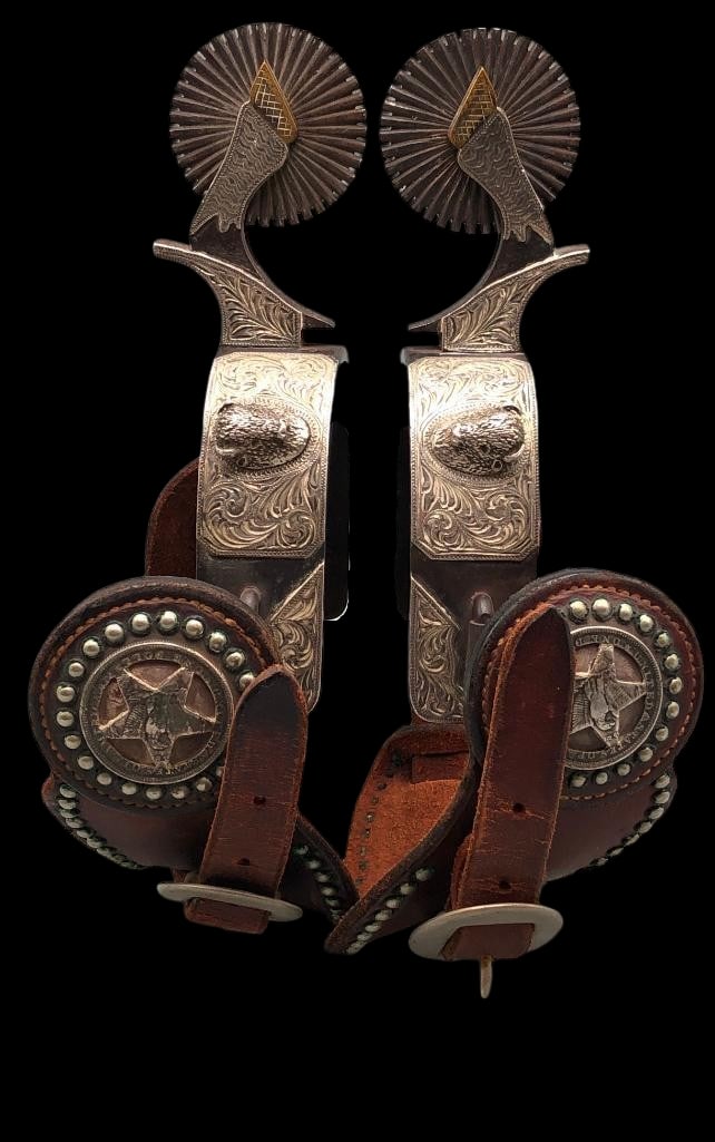 Fancy Pair Of Buffalo Theme E Garcia Spurs: Offered here for your consideration is a fancy pair of buffalo theme spurs by E. Garcia. Eduardo Garcia started making bits and spurs (having them produced in Mexico) in the late 1980s and continued u