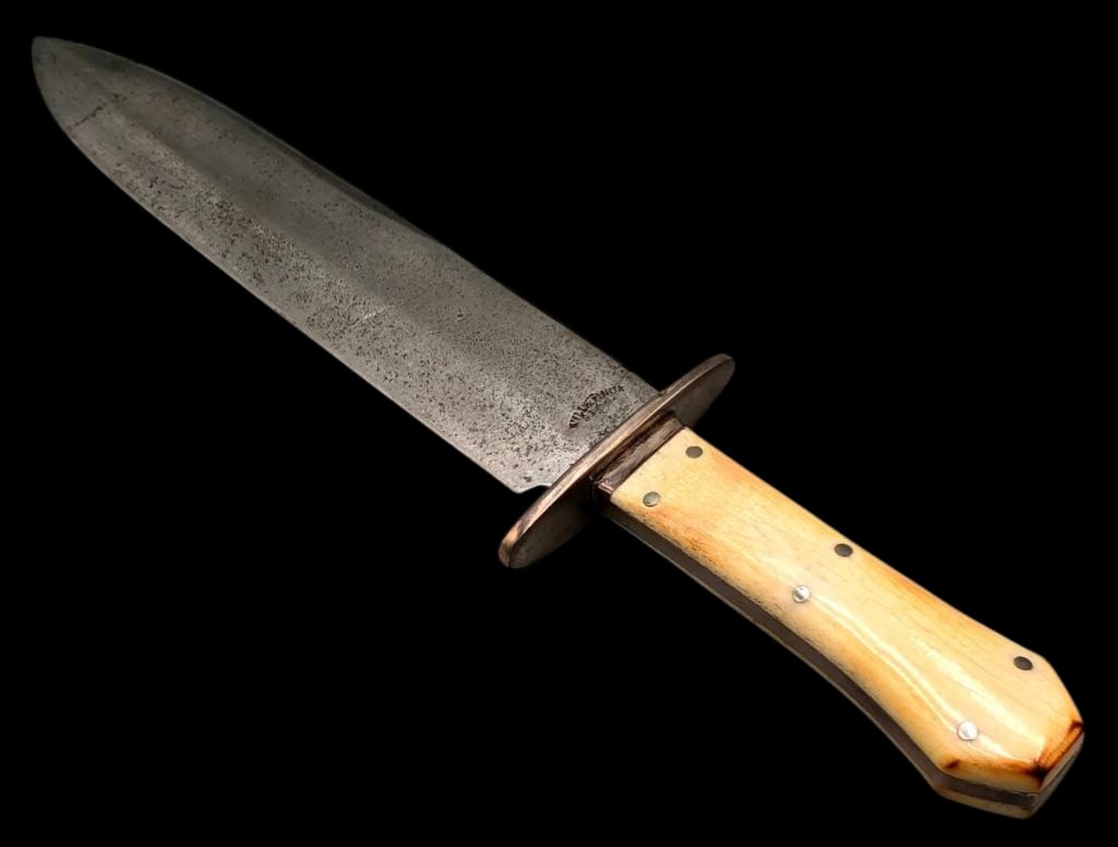 Will & Finck Ivory Handle Bowie Knife Circa 1860s: Offered here for your consideration is rare a Will & Finck Bowie knife from circa the 1860s. This knife features a steel blade, oval metal crossguard and is fitted with a bone handle secured with