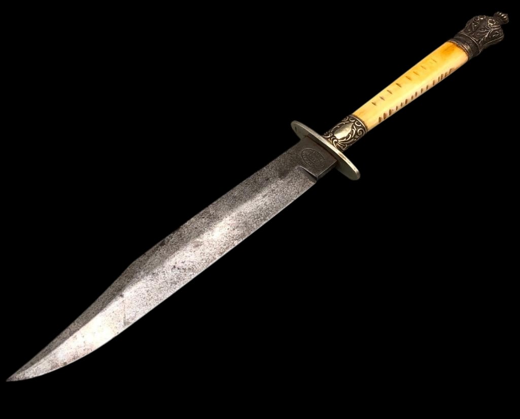 Thomas Bland Bowie Knife with Ivory Handle: Offered here for your consideration is Thomas Bland Bowie knife with ivory handle. This knife features a clip point steel blade, metal crossguard and ivory handle highlighted with an ornate metal pomm