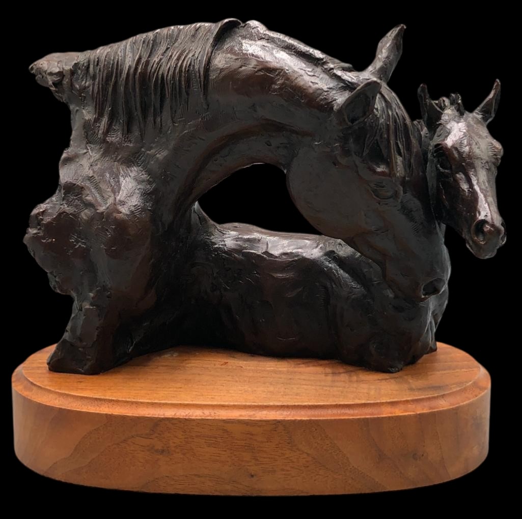 TLC - A Bronze By Cynthia Rigden 8 of 15: Offered here for your consideration is "TLC" a bronze statue by Cynthia Rigden numbered 8 of 15. This bronze bust depicts a mare taking care of its foal. It is mounted on a round wood base. Th