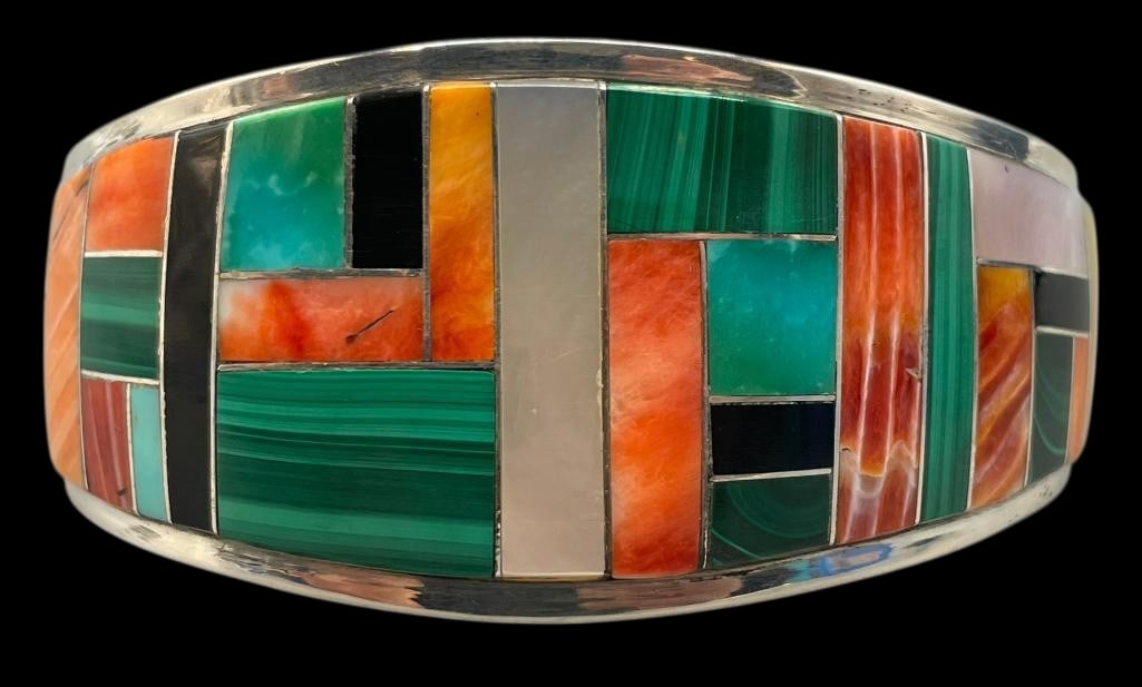 Sterling Silver And Multi Stone Inlay Bracelet By Rob Tracy: Presented for your consideration is a sterling silver and multi stone inlay bracelet by Rob Tracy. This beautiful bracelet features a channel inlay design created with mother of pearl, onyx, spiny oys
