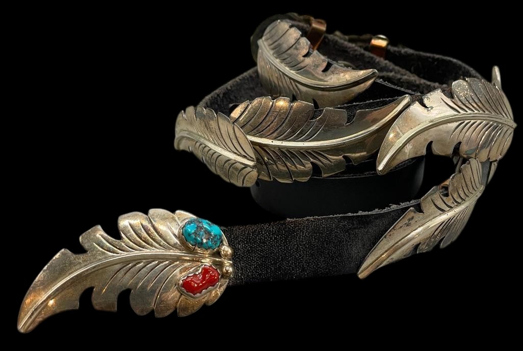 Sterling Silver Leaf Themed Concho Belt: Offered here for your consideration is a sterling silver leaf themed concho belt. The belt has 12 conchos and buckle each one cut and filed to look like a leaf. The conchos are on a black leather belt