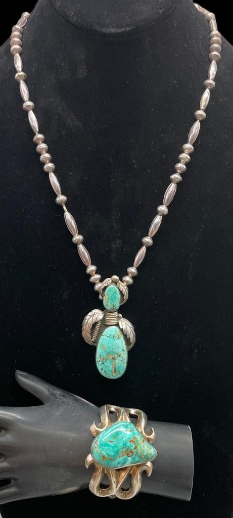 Vintage Sterling Silver And Turquoise Necklace With Bracelet: Offered here for your consideration is a vintage sterling silver and turquoise necklace with bracelet. Both pieces feature turquoise cabochons set in smooth silver bezels. Accenting the stones on the 