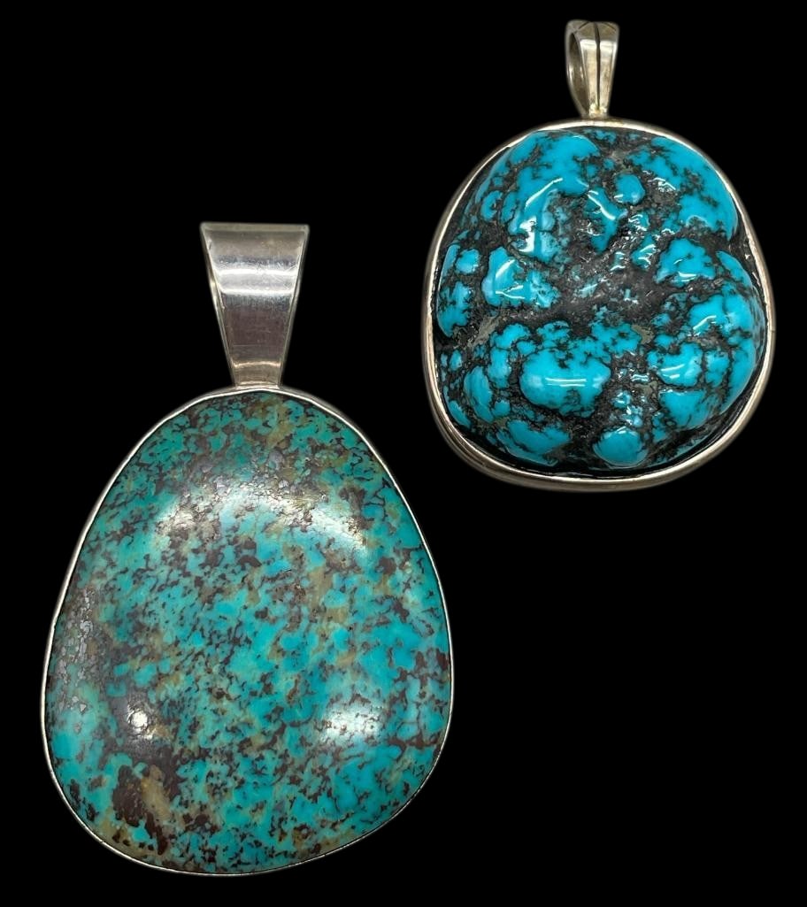 Two Sterling Silver And Turquoise Pendants: Offered here for your consideration are two sterling silver and turquoise pendants. These pieces feature a smooth or nugget turquoise cabochon set in a smooth silver bezel. Add these pendants to your 