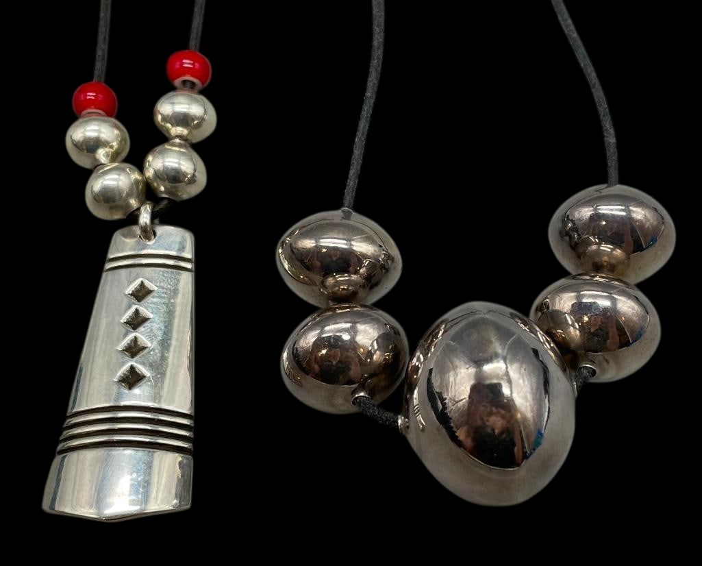 Two Sterling Silver Beaded Necklaces - One With A Pendant by Cippy Crazyhorse: Offered here for your consideration are two sterling silver beaded necklaces - one with a pendant by Cippy Crazyhorse. Both pieces feature sterling silver beads with one further highlighted with red b