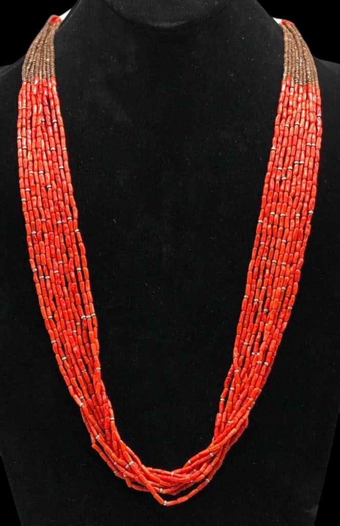 10 Strand Coral, Heishi And Sterling Silver Necklace With Pueblo Wrap: Offered here for your consideration is a 10 strand coral, Heishi and sterling silver necklace with Pueblo wrap. This necklace features strands of lovely coral beads accented with sterling silver beads