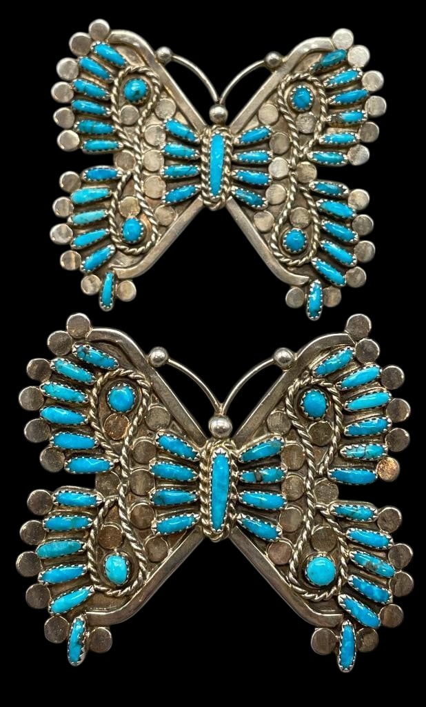 Pair Of Turquoise And Sterling Silver Butterfly Rings: Offered here for your consideration is a pair of turquoise and sterling silver butterfly rings. Both pieces showcase a butterfly design and feature a cluster of round and needlepoint turquoise cabocho