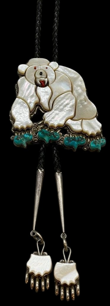 Bear Themed Multi Stone And Sterling Silver Zuni Bolo Tie By Ray And Evangeline Wyaco - Circa 1980s: Offered here for your consideration is a bear themed multi stone and sterling silver Zuni bolo tie by Ray and Eva Wyaco- circa 1980s. The slide features a multi stone bear design inlay of mother of