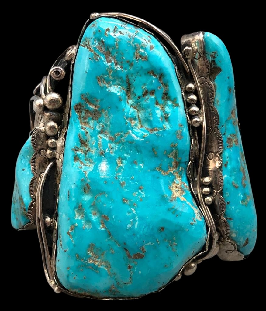 Statement Turquoise And Sterling Silver Bracelet By RJE: Offered here for your consideration is a statement turquoise and sterling silver bracelet by RJE. This piece feature three large turquoise nugget cabochons set in scalloped silver bezels. Accenting