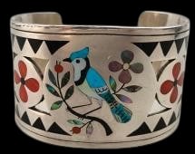 Dennis And Nancy Edaakie Zuni Inlay And Sterling Silver Bracelet: Offered here for your consideration is a Dennis and Nancy Edaakie Zuni inlay and sterling silver bracelet. This piece features a multi stone pictoral inlay of turquoise, coral, mother of pearl and oth