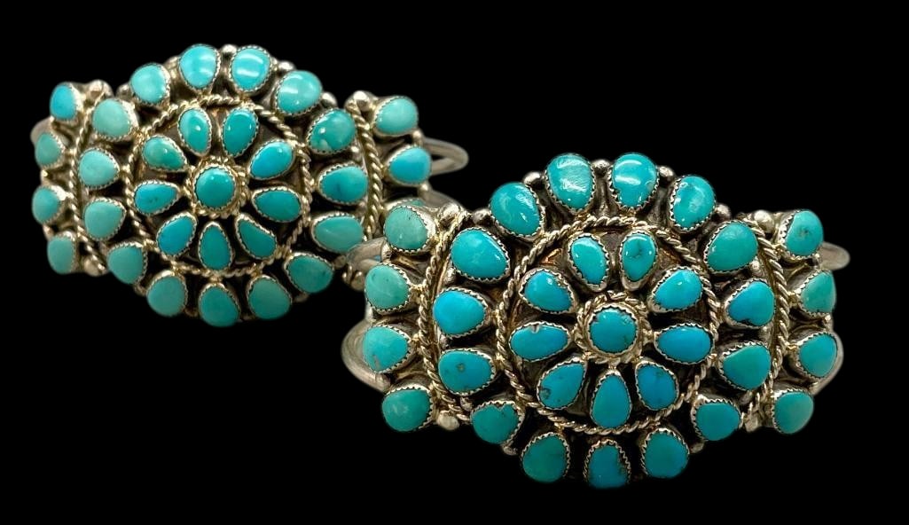 Two Matching Sterling Silver And Cluster Turquoise Bracelets By Paul And Nancy Leekity 1980s: For your bidding enjoyment we present two matching sterling silver and cluster turquoise bracelets by Paul and Nancy Leekity 1980s. Both pieces feature a cluster of turquoise cabochons set sawtooth si