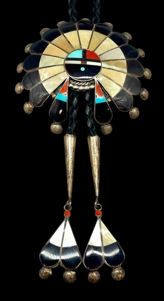 Zuni Sunface Inlay Bolo By Pauline Lonjose: Offered here for your consideration is a Zuni Sunface inlay bolo by Pauline Lonjose. The slide feature a multi stone Sunface inlay design of turquoise, coral, mother of pearl and onyx accented with si
