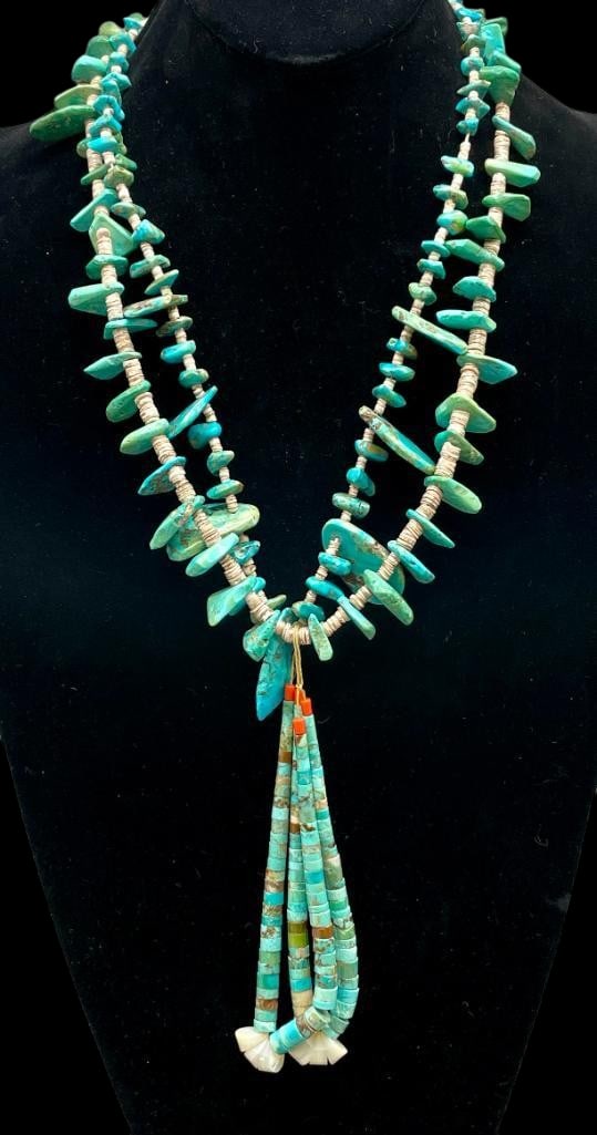 Vintage Multi Strand Turquoise And Shell Jocla Necklace: Offered here for your consideration is a vintage multi strand turquoise and shell Jocla necklace. This piece features two strands of turquoise tab beads in graduated sizes highlighted with shell Heish