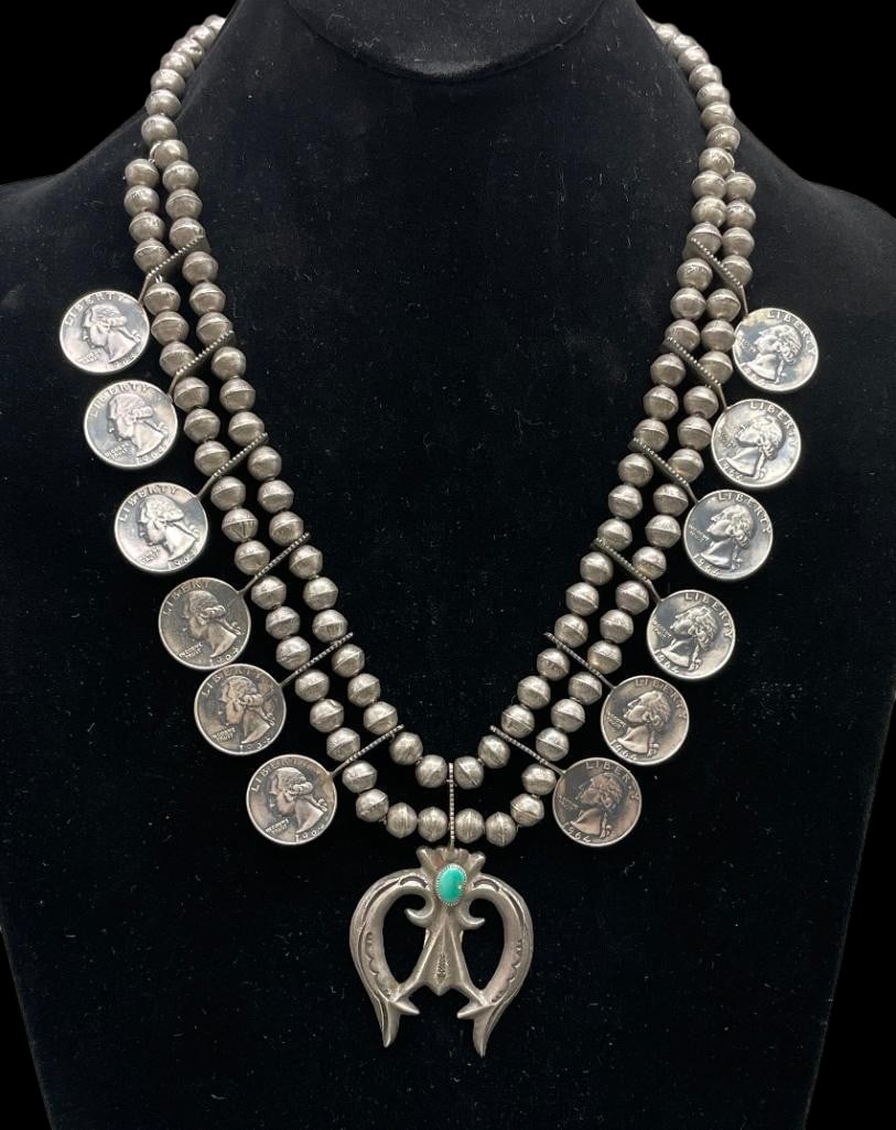 1964 Liberty Quarter And Naja Sterling Silver Necklace: Offered here for your consideration is a 1964 Liberty quarter and naja sterling silver necklace. This piece feature a carinated cast naja highlighted with a turquoise cabochon set in a sawtooth silver