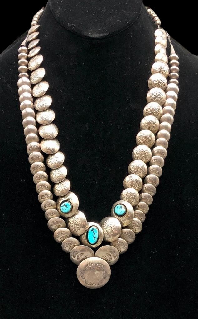 Two Sterling Silver Pillow Necklaces: Offered here for your consideration are two sterling silver pillow necklaces. Both pieces feature pillow beads in graduated sizes accented with hand stamped designs along with round silver beads. Thre